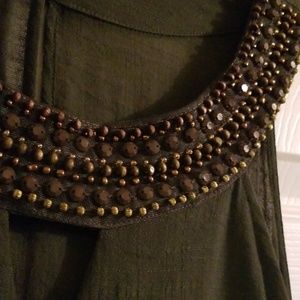 Sleeveless blouse with jewels/stones